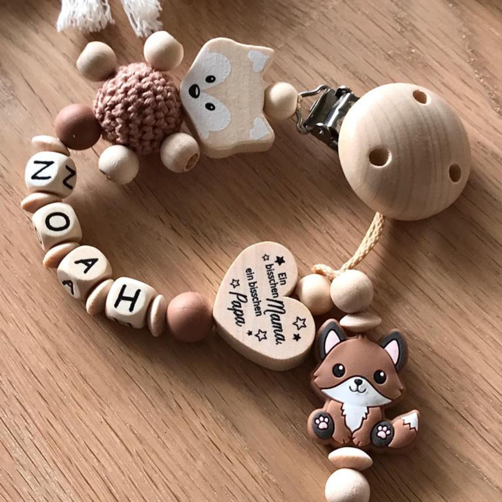 Zauberhaftes Geschenke Set für Jungen und Mädchen mit Namen bestehend aus Schnullerkette & Greifling