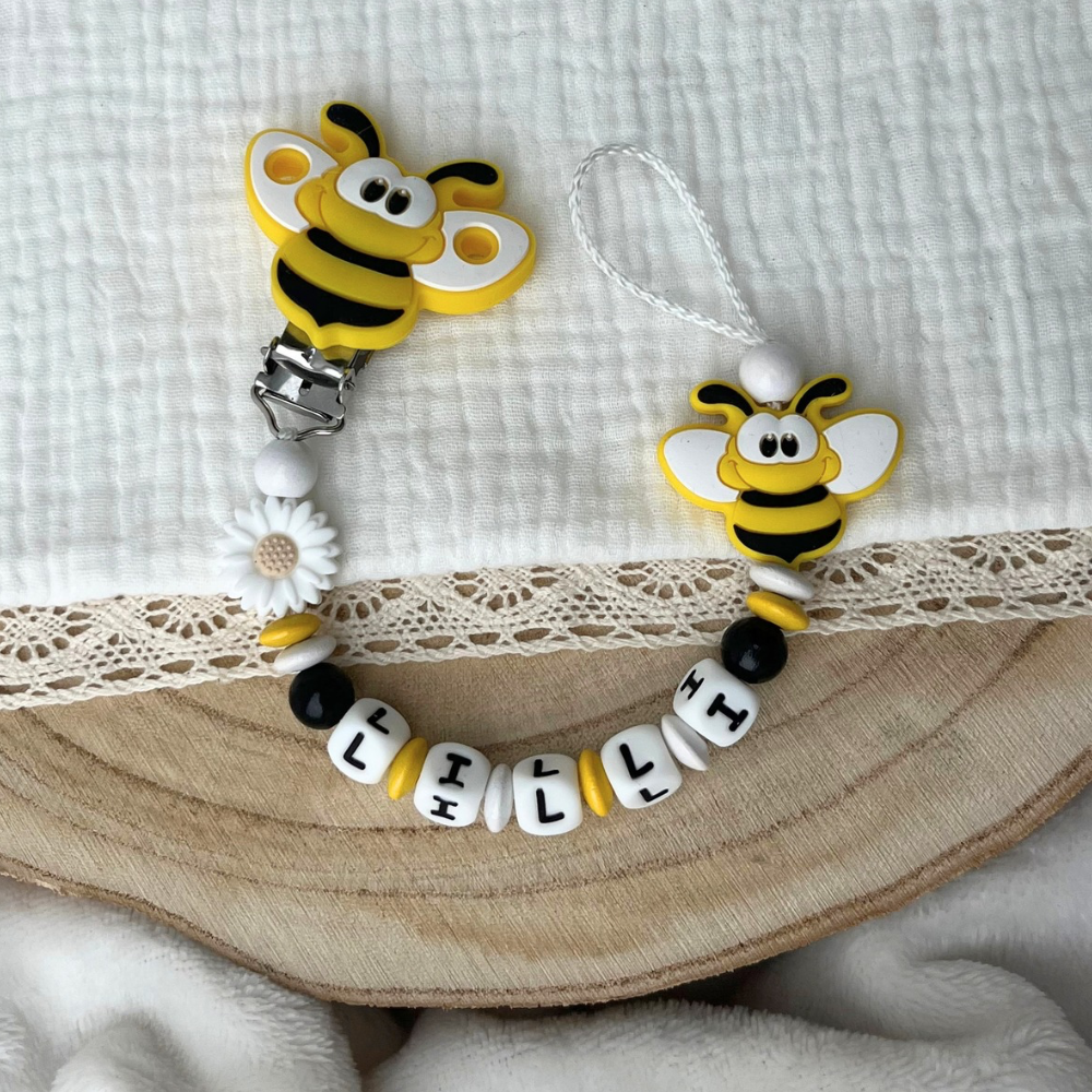 Schnullerkette mit Namen - personalisiert - Biene - schwarz weiß gelb - Geschenk zur Geburt, Taufe, oder Babyparty