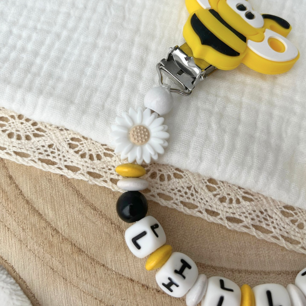 Schnullerkette mit Namen - personalisiert - Biene - schwarz weiß gelb - Geschenk zur Geburt, Taufe, oder Babyparty