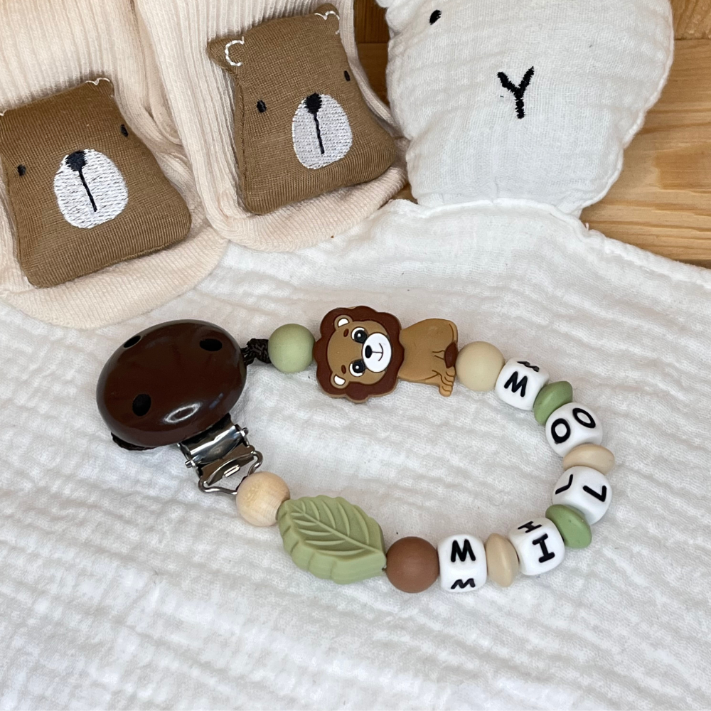 Schnullerkette mit Namen für Jungen Löwe braun grün beige