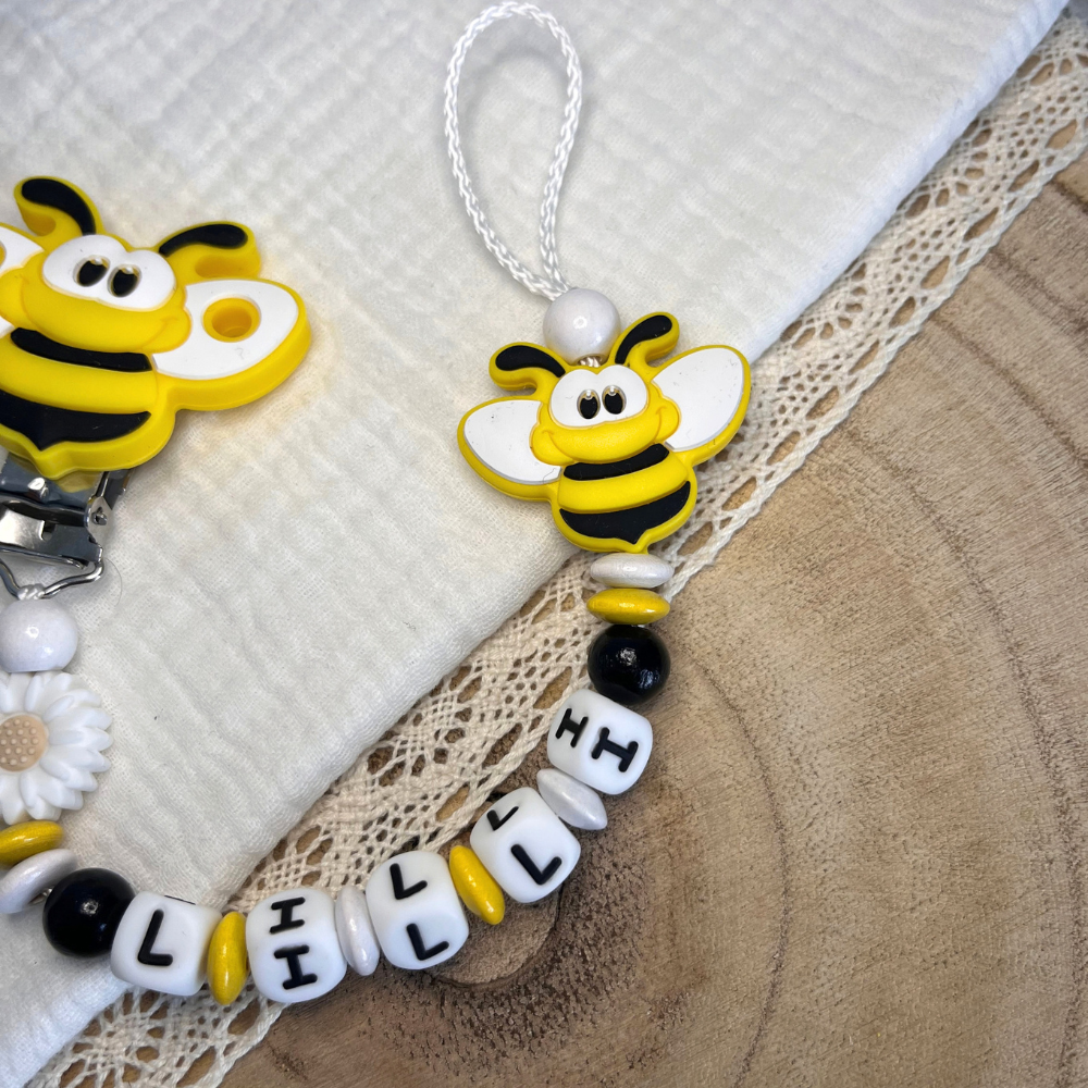 Schnullerkette mit Namen - personalisiert - Biene - schwarz weiß gelb - Geschenk zur Geburt, Taufe, oder Babyparty