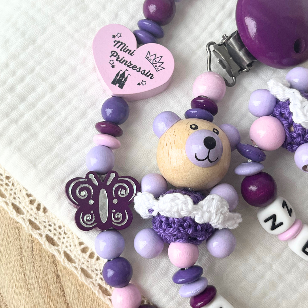 Personalisierte Baby Geschenkset Mini Prinzessin – Schnullerkette, Greifling & Kinderwagenkette in Lila und Rosa