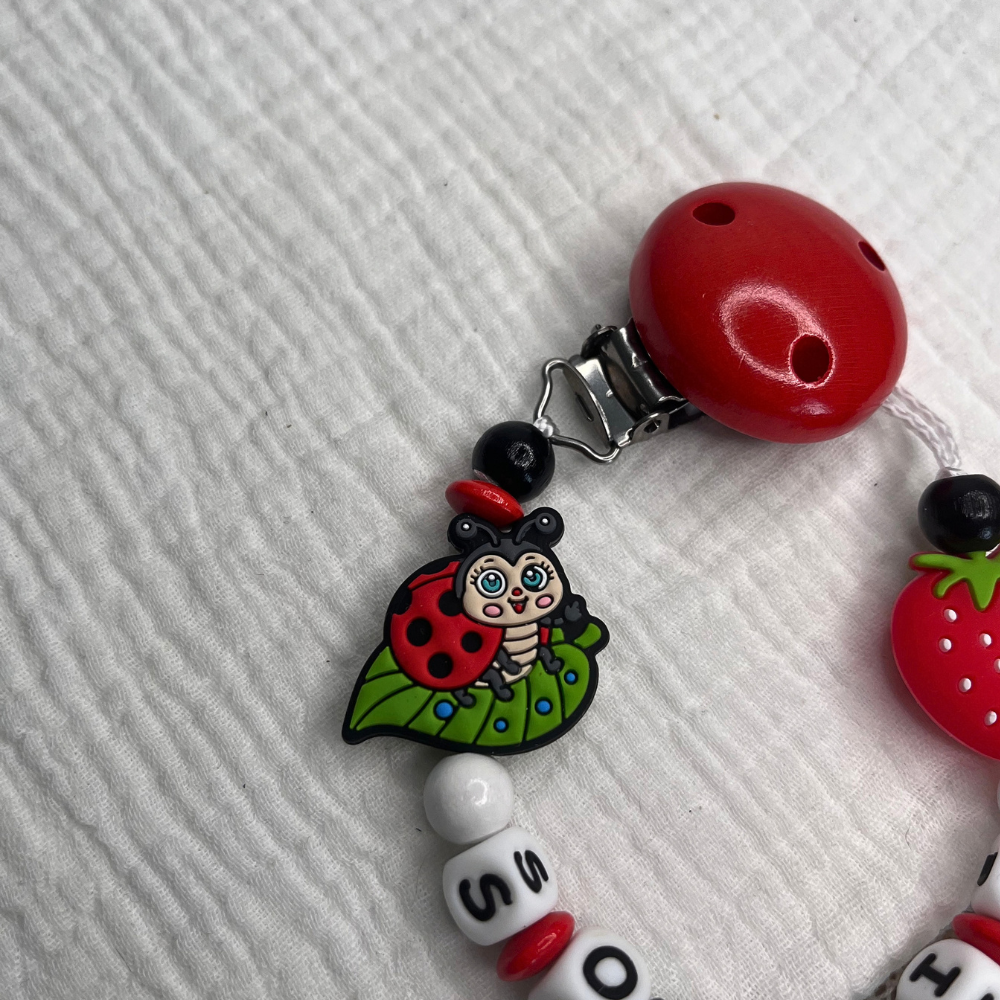 Personalisierte Schnullerkette mit Namen - Erdbeere Marienkäfer – Mädchen | Rot Weiß Grün