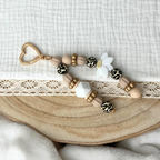 Schlüsselanhänger Leo-Design mit Blume – Handgemachter Taschenanhänger in Naturtönen