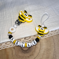 Schnullerkette mit Namen - personalisiert - Biene - schwarz weiß gelb - Geschenk zur Geburt, Taufe, oder Babyparty