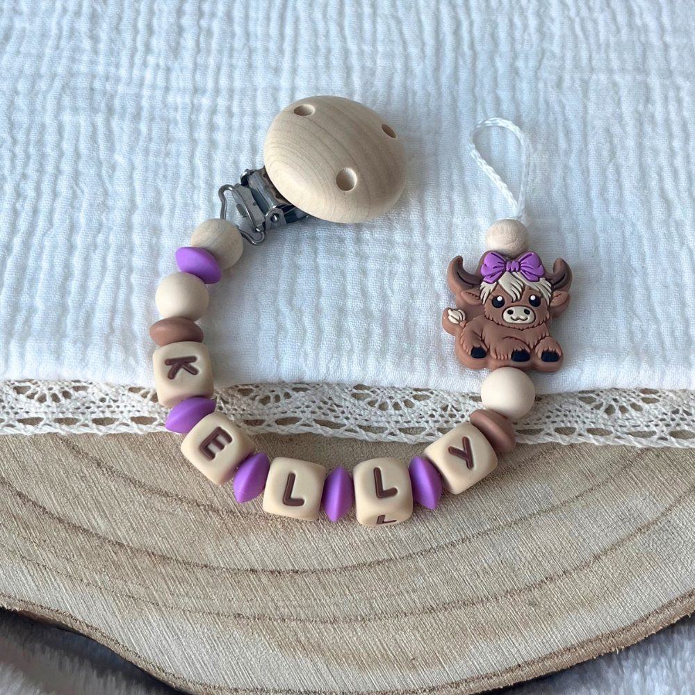 Schnullerkette mit Namen - personalisiert - Kuh mit Schleife - Baby Geschenk - natur lila