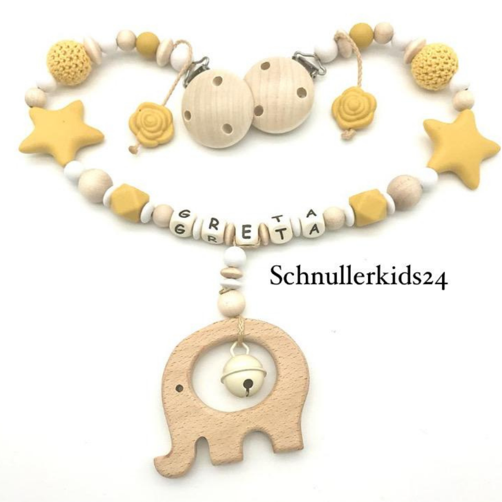 Kinderwagenkette mit Wunschnamen - Senfgelb mit Blumen und Sterne + Holzelefant